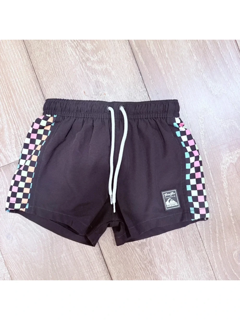 Binky bro x quicksilver black checkered swim trunks